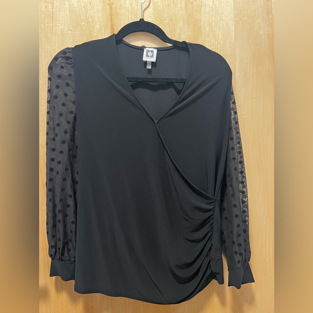 Black faux wrap shirt with sheer polka dot sleeves